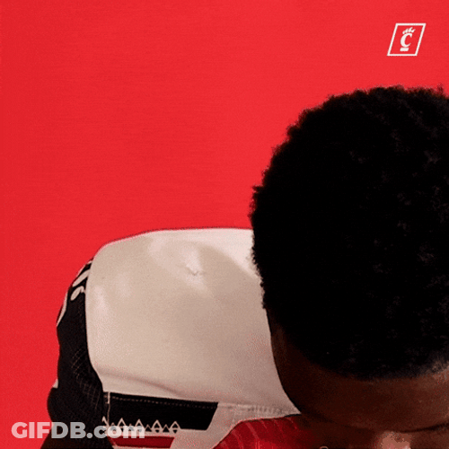 Sauce Gardner Lifting Necklace Around His Neck GIF