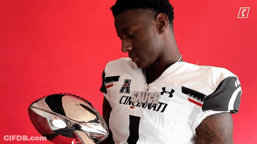Sauce Gardner Looking At Silver Trophy GIF