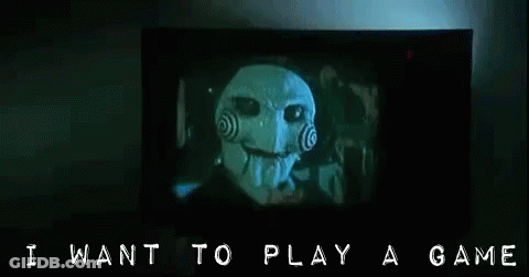 Saw Puppet On TV Saying I Want To Play A Game GIF