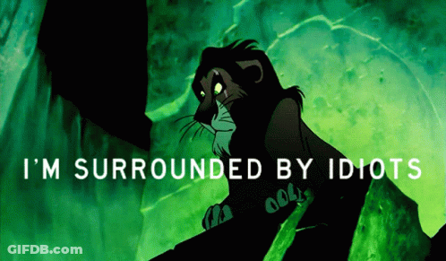 Scar From The Lion King Sits On A Rock With The Words I 'M Surrounded By Idiots Above Him GIF