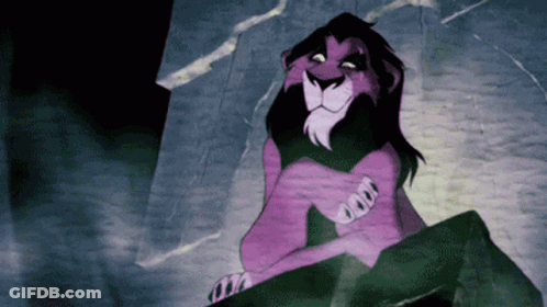 Scar Sitting On Rock Eyes Closed GIF