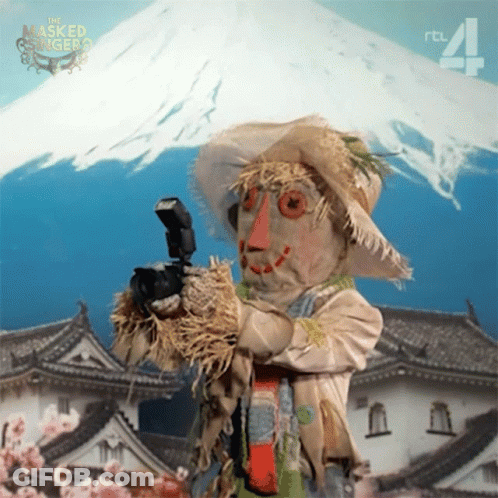 Scarecrow Taking Picture At Fuji Mountain GIF