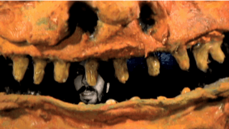 Scared Man Inside The Big Monster's Mouth With Missing Teeth GIF