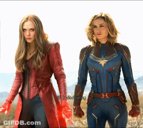 Scarlet Witch And Captain Marvel Standing Together GIF