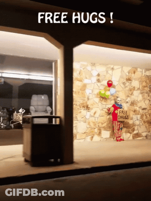 Scary Clown Giving Free Hugs GIF