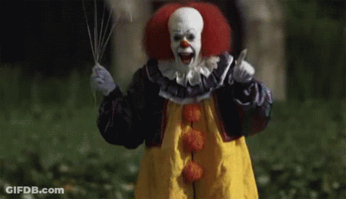 Scary Clown Holding Knife And Balloon GIF