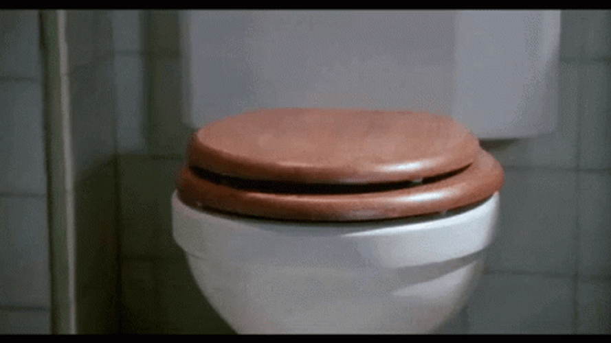 Scary Clown Monster Coming Out In Toilet GIF