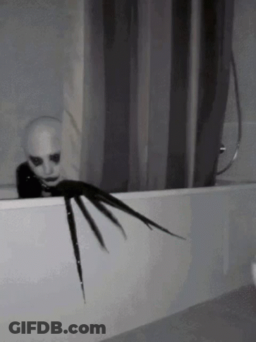Scary Creature Sticking Head Out Of Bath Tub GIF