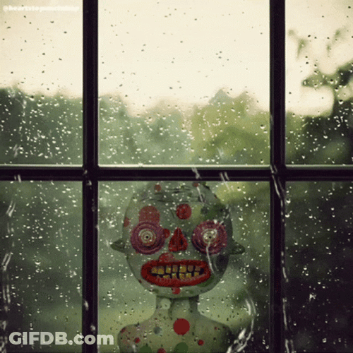 Scary Face Looking Out The Window GIF