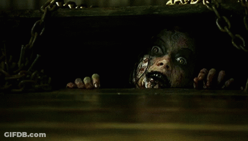 Scary Face Peeking Out Of Hole GIF