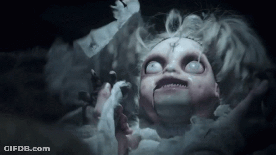 Scary White Doll GIF