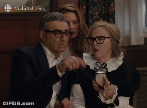Schitt's Creek Man And Two Women Looking GIF