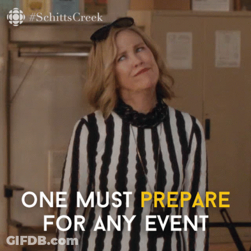 Schitt's Creek Poster Woman In Striped Shirt GIF