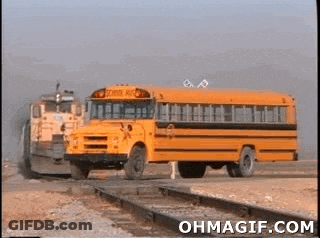 School Bus Driving On Train Tracks GIF