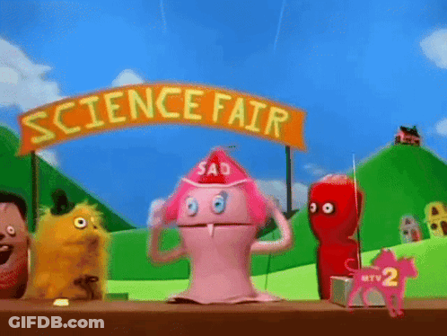 Science Fair Sign Above Pink Monster GIF