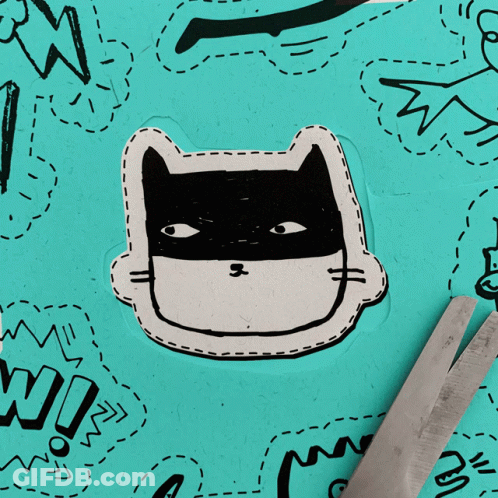 Scissors Cutting Cat Wearing Batman Mask GIF