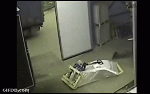 Scissors Laying On Dark Room Floor GIF