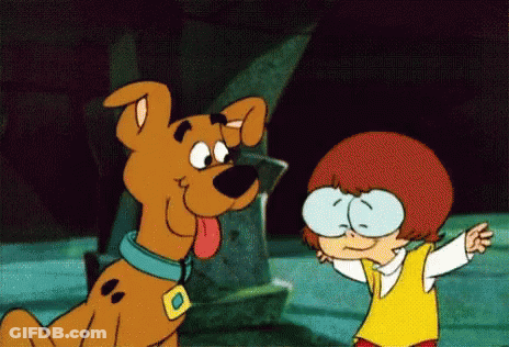 Scooby Doo And Boy With Glasses Standing Together GIF