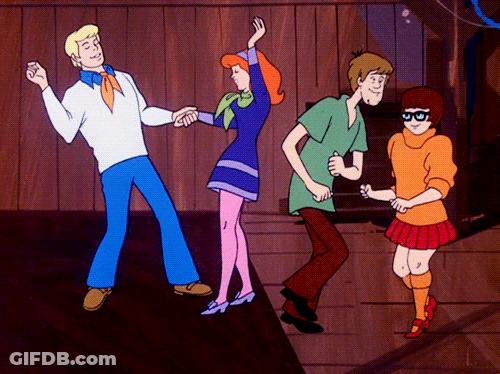 Scooby Doo And His Friends Are Dancing In A Cartoon GIF