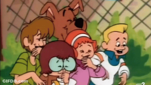 Scooby Doo And His Friends Are Playing With A Little Girl GIF