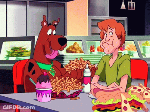 Scooby Doo And Shaggy Are Sitting At A Table Eating French Fries And Hamburgers GIF