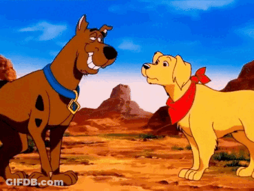 Scooby Doo And Yellow Dog In Desert GIF
