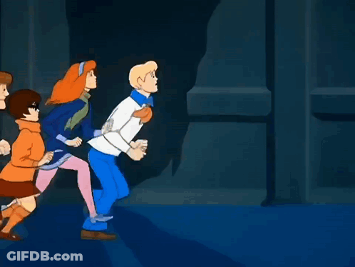 Scooby Doo Characters Running In Dark Room GIF