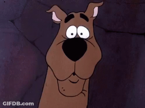 Scooby Doo From The Scooby Doo Cartoon Is Making A Surprised Face . GIF