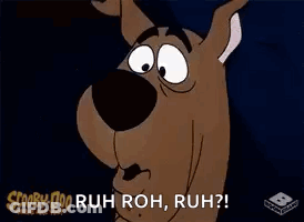 Scooby Doo Is Making A Funny Face And Saying `` Ruh Roh , Ruh '' . GIF