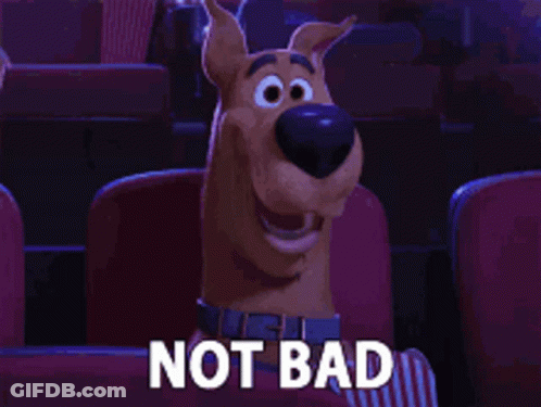 Scooby Doo Is Sitting In A Theater With The Words Not Bad Above Him GIF
