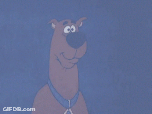 Scooby Doo Is Smiling With His Eyes Closed And A Diamond Necklace Around His Neck GIF