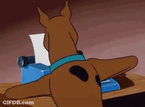 Scooby Doo Is Typing On A Typewriter And Looking At A Piece Of Paper That Says " Help " GIF