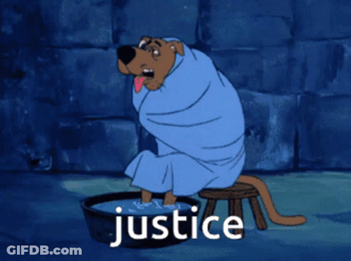 Scooby Doo Is Wrapped In A Blue Blanket And Sitting In A Bowl Of Water With The Word Justice Written Above Him GIF