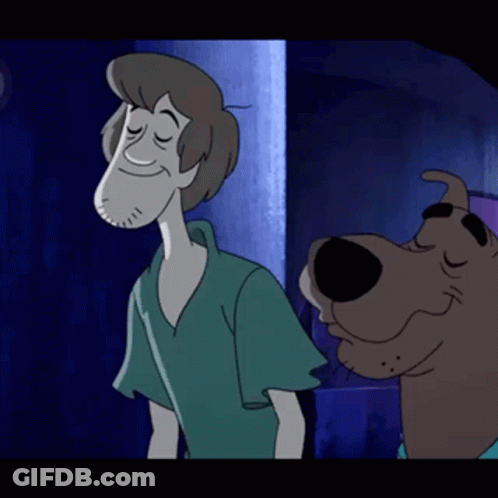 Scooby Doo Standing Next To Man With Eyes Closed GIF
