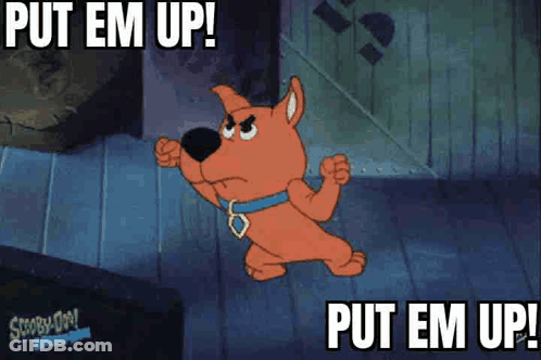 Scooby Doo With Fist In Air Saying Put Em Up GIF