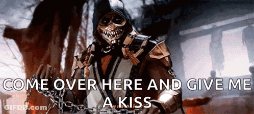 Scorpion From Mortal Kombat Is Chained Up And Says Come Over Here And Give Me A Kiss . GIF