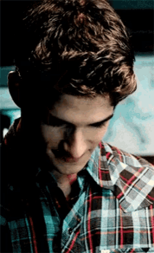 Scott McCall Teen Wolf Lifting Head And Smiling GIF