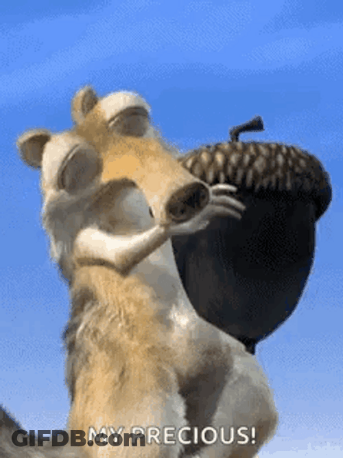 Scrat Rubbing Precious Acorn GIF