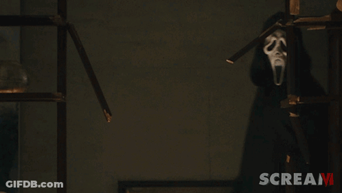 Scream Movie Poster With Hooded Figure GIF