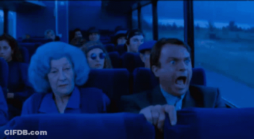 Screaming Man In Suit On Blue Bus GIF