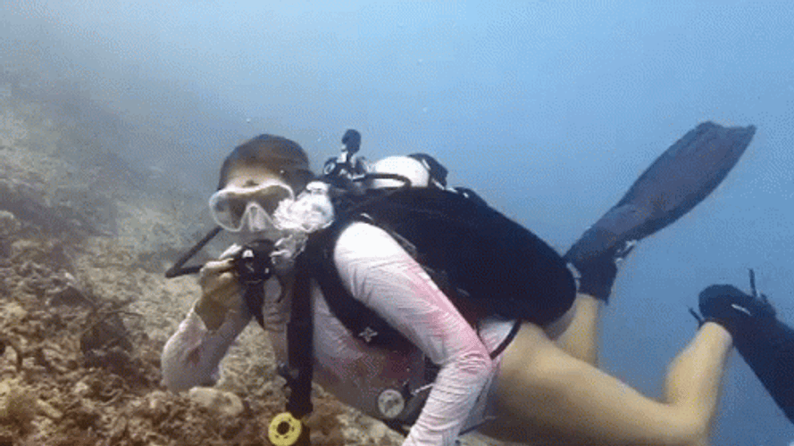 Scuba Diving Woman Blow Kisses GIF