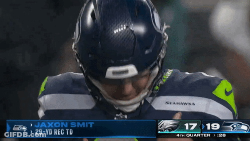 Seahawks Player Jaxon Smith In Front Of Scoreboard GIF