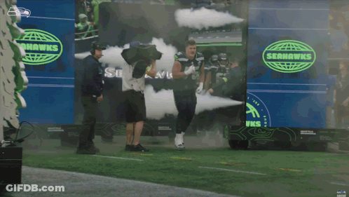 Seahawks Player Walking On Field GIF