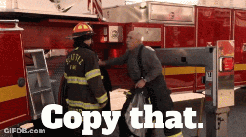 Seattle Fireman Talking To Another Man GIF