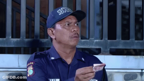 Security Guard Holding Money GIF