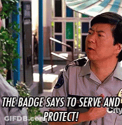 Security Guard Looking At Cell Phone GIF