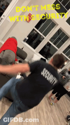 Security Man Kicking Another Man GIF