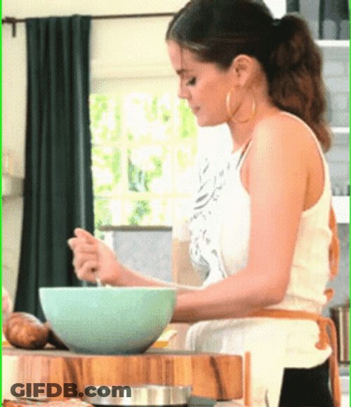 Selena Gomez Stabbing Food In Bowl GIF