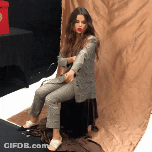 Selena Gomez Straight Arm Pulldown GIF