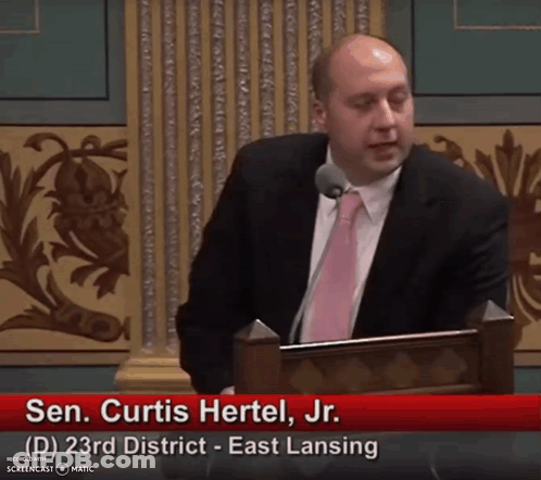 Sen Curtis Hertel Jr. Giving Speech At Podium GIF